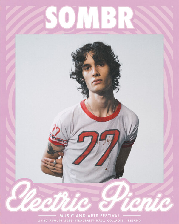 Sombr wearing a t shirt - Electric Picnic Logo